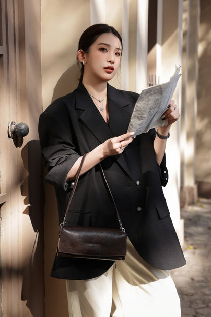 Rear view of the coffee bag worn crossbody