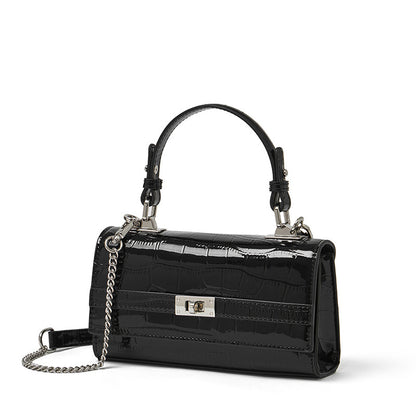 Black croco-embossed cowhide leather envelope crossbody bag, front view on white background