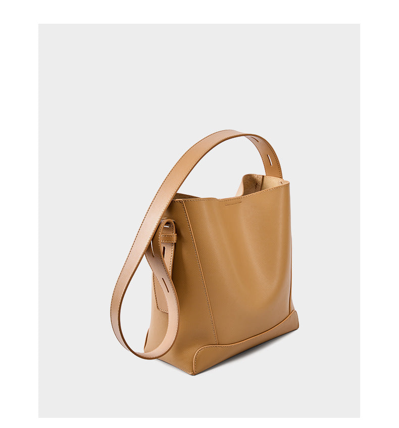 Side view of Salt Khaki bucket bag on white background