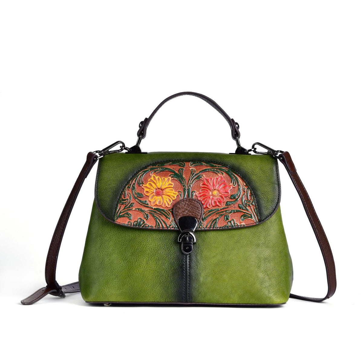 Close-up of the green bag's floral flap, handle, and strap