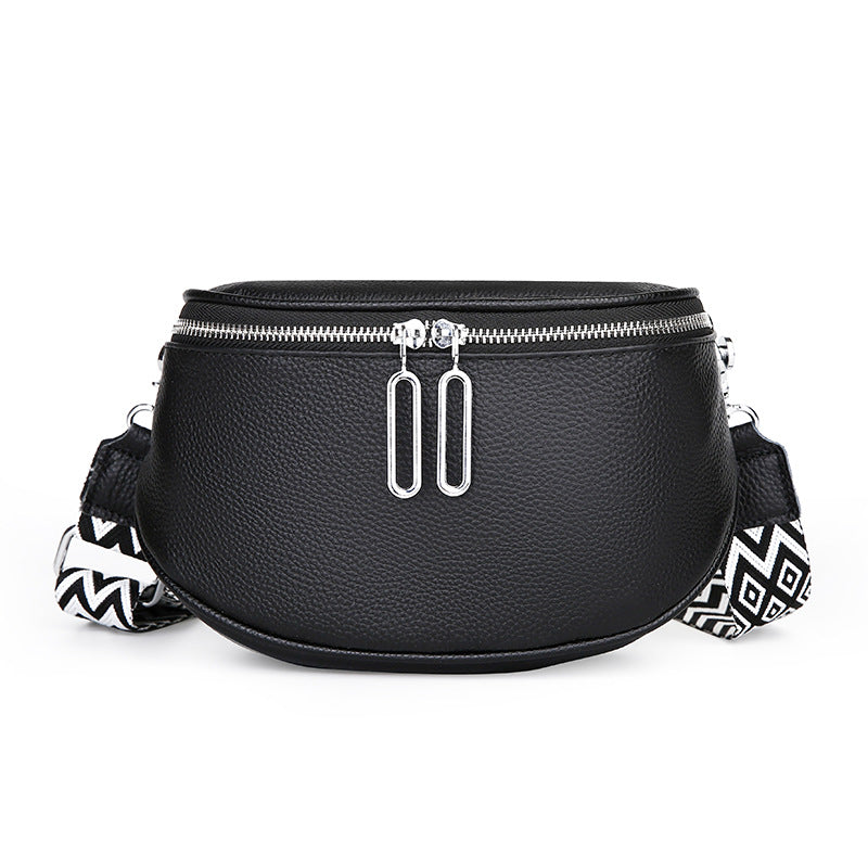 Black bag with geometric patterned strap