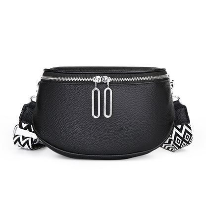 Black bag with geometric patterned strap