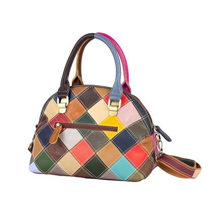 Back of the cowhide bag with colorful geometric patchwork and exterior zip pocket