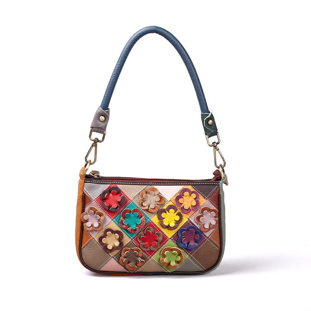 Front view highlighting raised flower details and colorblock panels