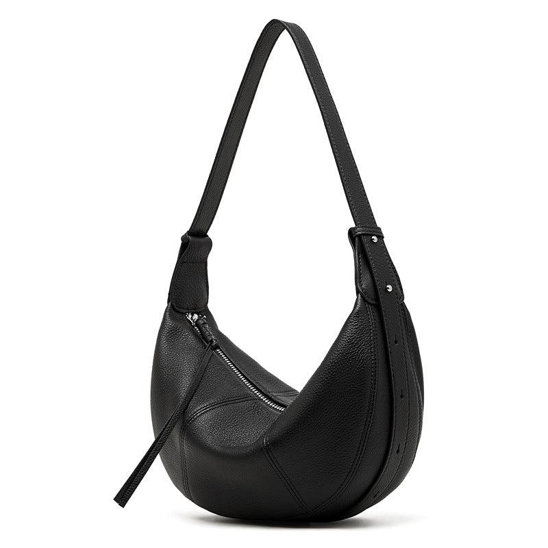 Black cowhide crescent hobo crossbody bag with adjustable strap