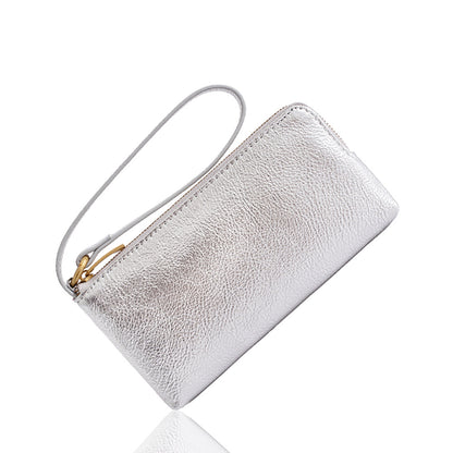 Silver pebble-grain cowhide leather long wallet with wrist strap shown at angle