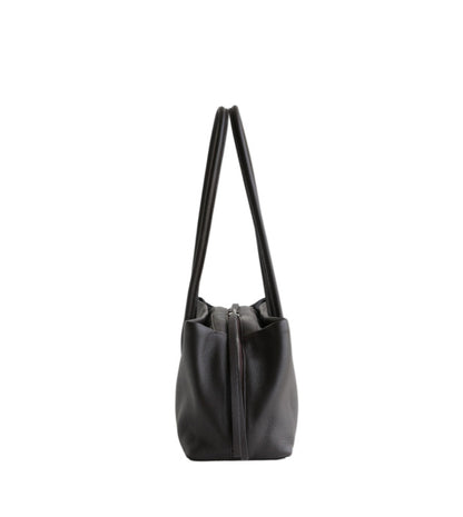 Black leather tote shown in profile