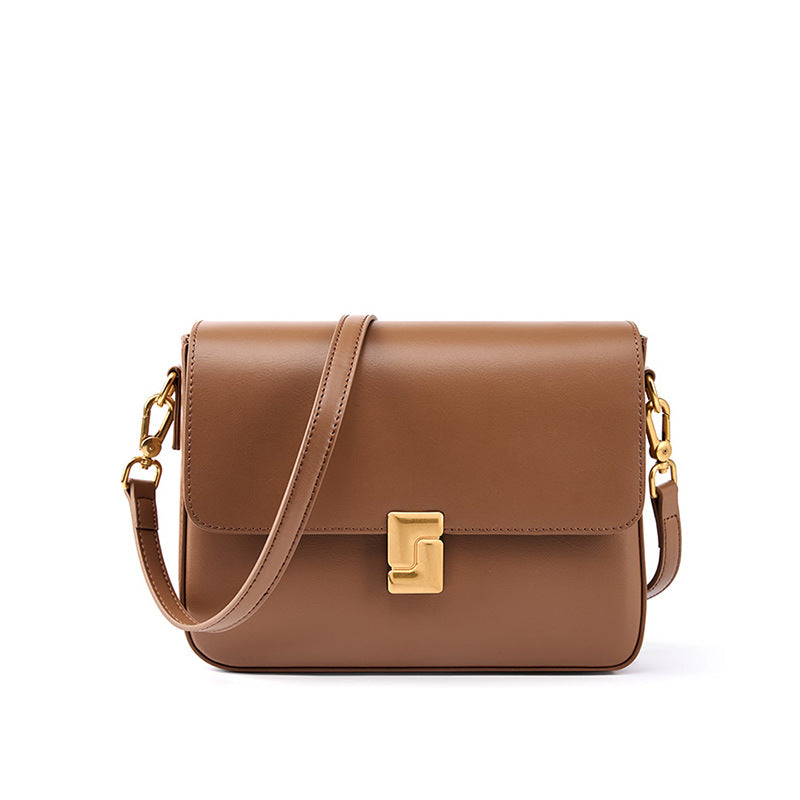 Tan brown cowhide leather crossbody bag with antique gold hardware