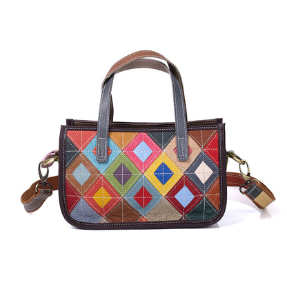 Front view of the multicolor geometric leather handbag with dual handles