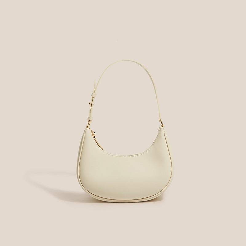 Coconut milk white crescent hobo shoulder bag on plain background