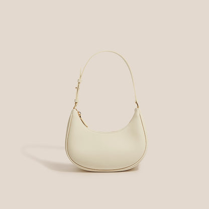 Coconut milk white crescent hobo shoulder bag on plain background