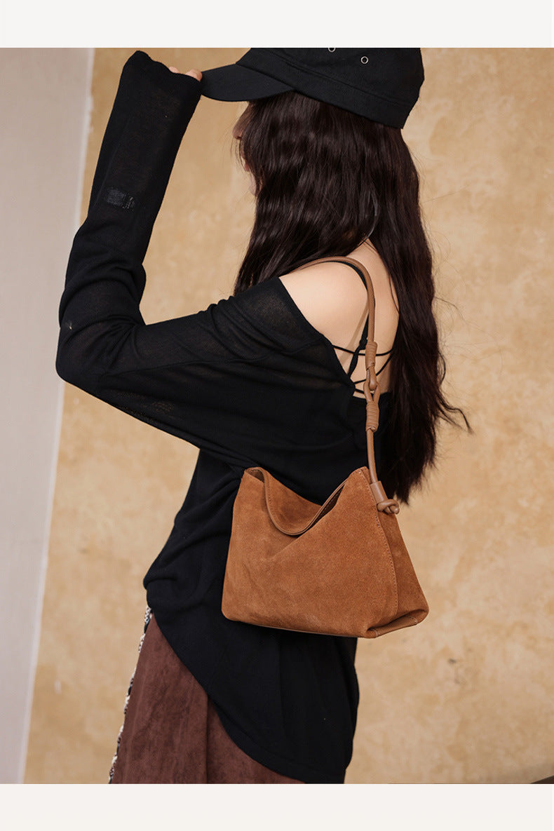 Side view of the bag worn over the shoulder