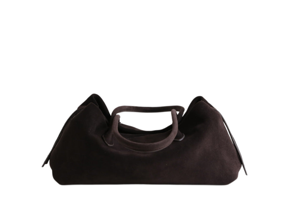 Coffee tote side profile with zip detail