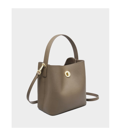 Khaki bucket bag three-quarter view on white background