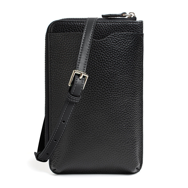 Black pebbled leather vertical phone bag with back slip pocket and adjustable strap