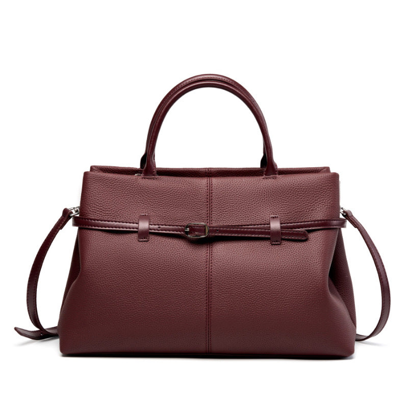 Wine red pebbled cowhide leather tote bag with front strap detail