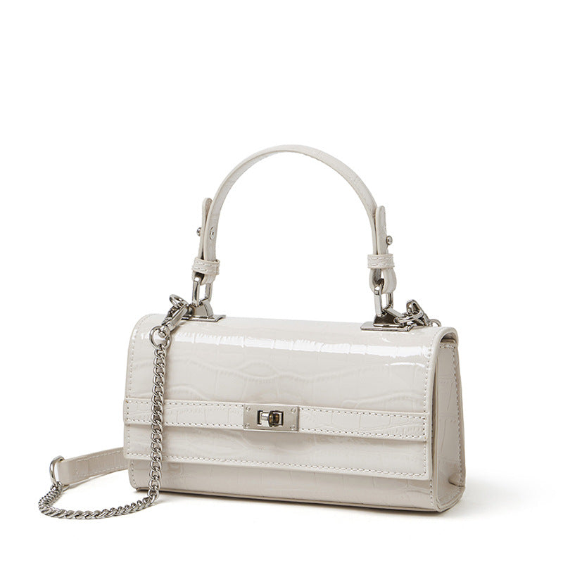Cream white croco-embossed cowhide leather envelope crossbody bag, front view on white background