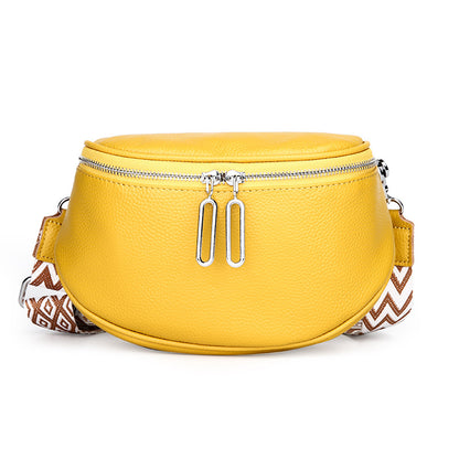 Yellow leather saddle bag with patterned strap