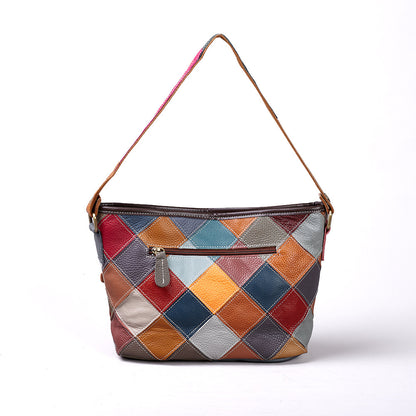Reverse view highlighting the patchwork and zip pocket