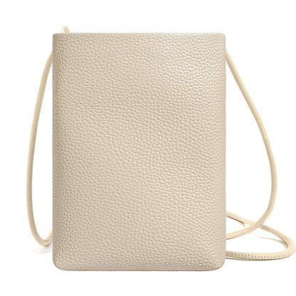 Offwhite pebbled leather phone bag with adjustable strap front display