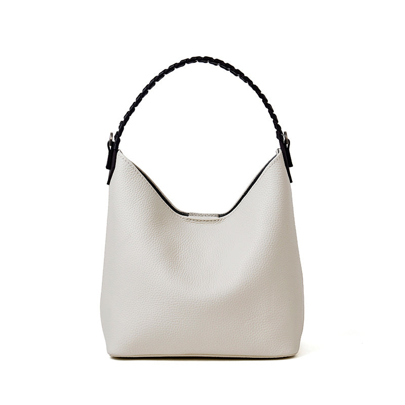 White top-grain cowhide leather bucket bag with braided top handle, front view