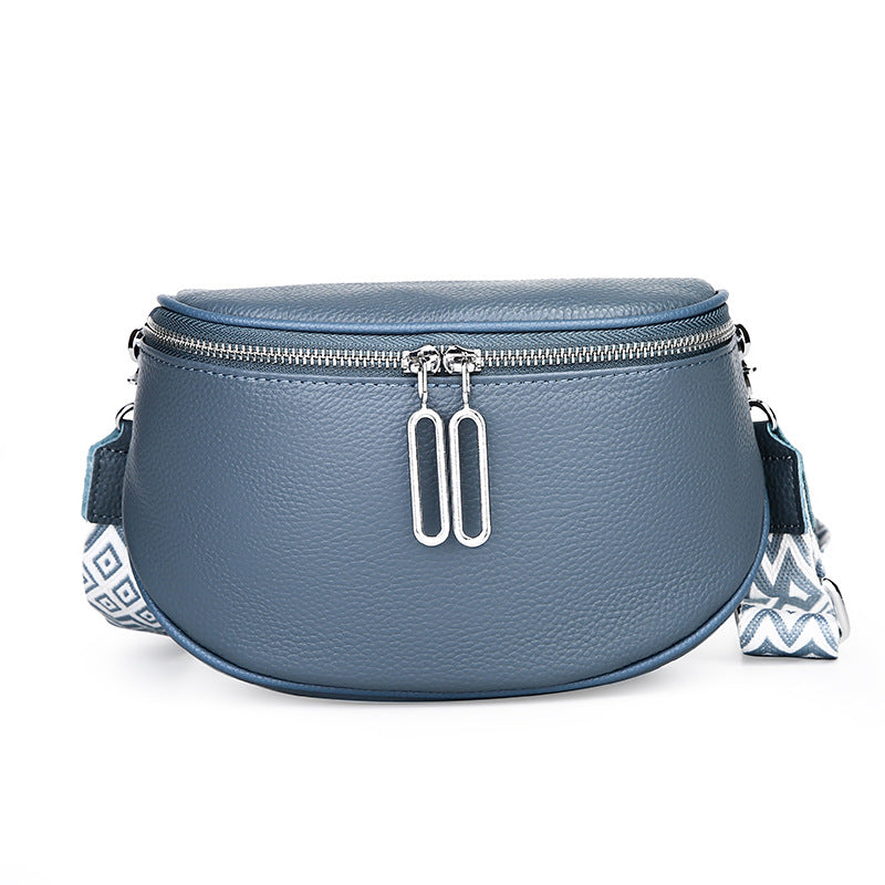 Blue-gray crossbody bag with geometric strap