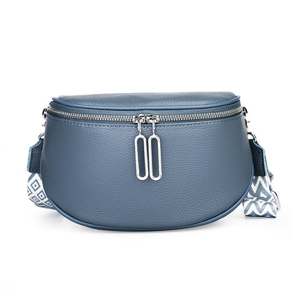 Blue-gray crossbody bag with geometric strap