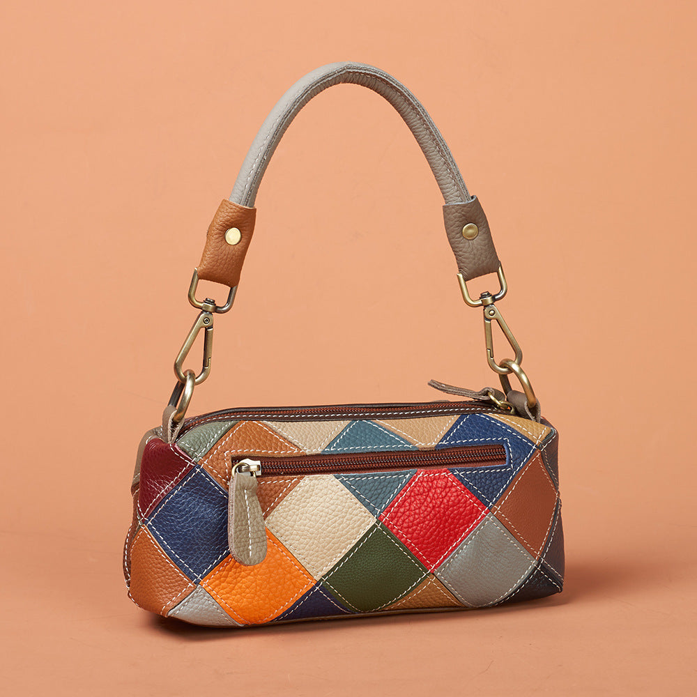 Geometric patchwork back of shoulder bag shown in use
