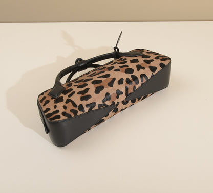 Open zip-top view revealing the lined main compartment and slip pocket