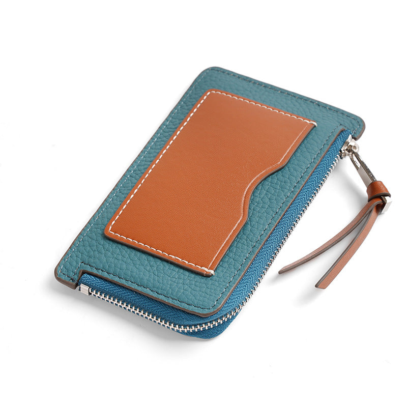 Sky blue and tan color-block compact wallet with leather zipper pull
