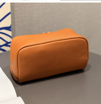 Sky blue leather cosmetic pouch with zip closure