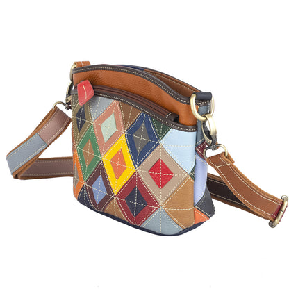 Angled view showing the patchwork side and shoulder strap