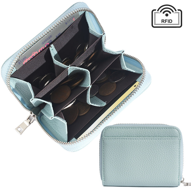 Light blue slim leather coin wallet with visible card slots
