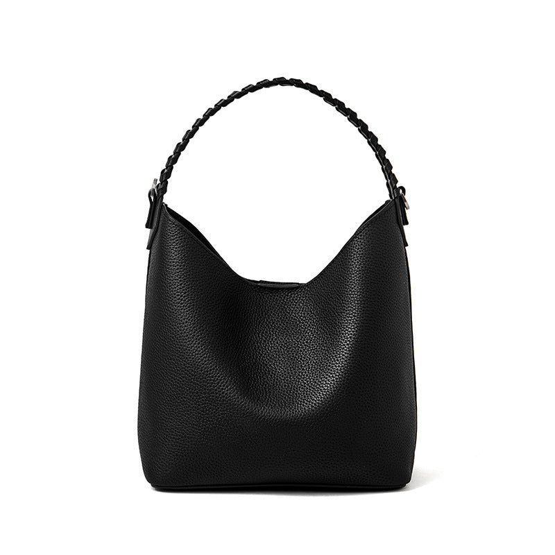Black top-grain cowhide leather bucket bag with braided top handle, front view