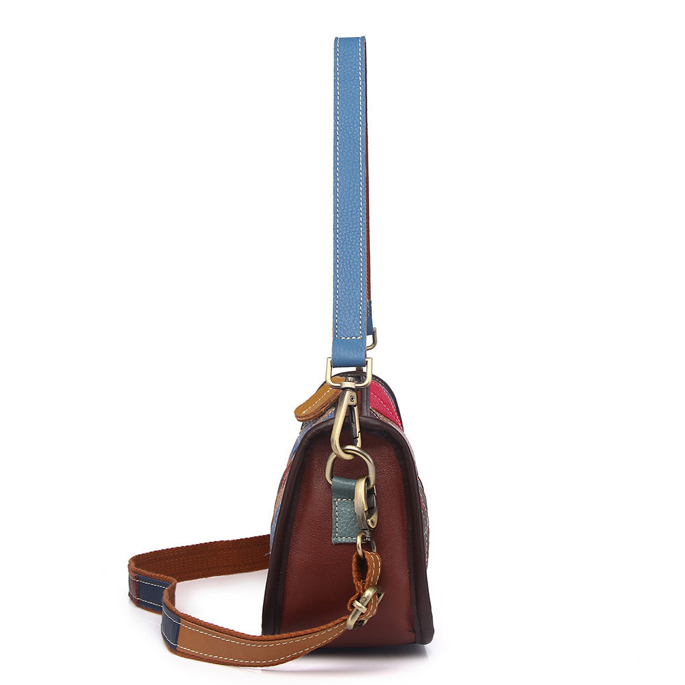 Side view of the cowhide shoulder bag and its attached shoulder strap