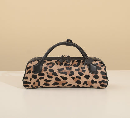 Top-down angled view of the bag's profile and handles