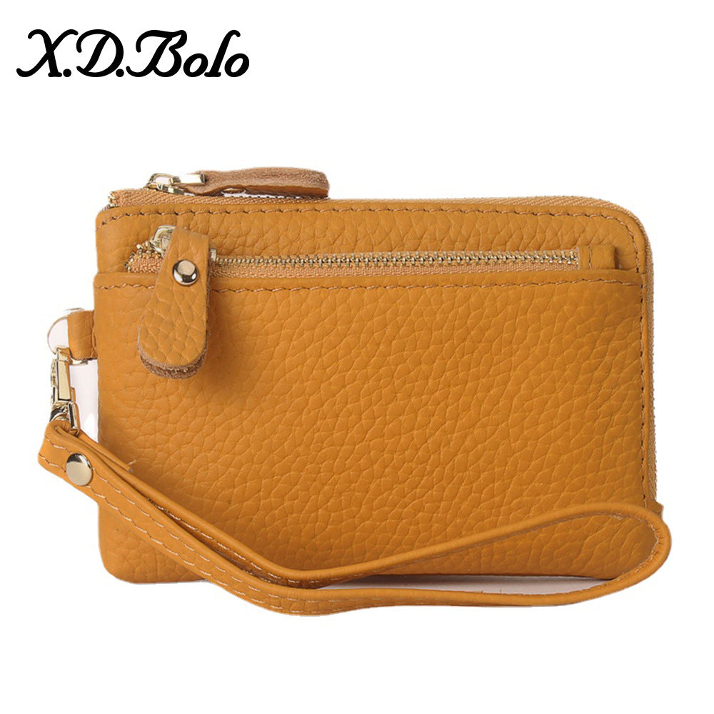 Bright yellow compact leather wallet with zip closure and keychain
