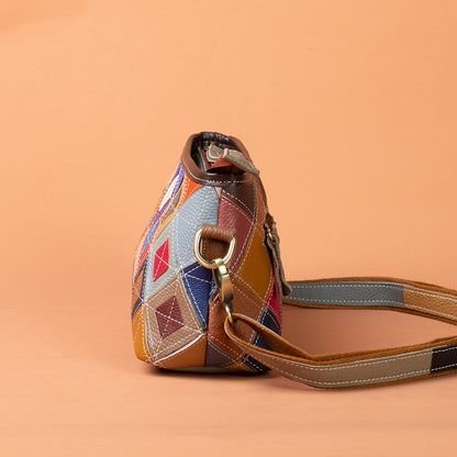 Side profile showing the bag's depth and shoulder strap hardware