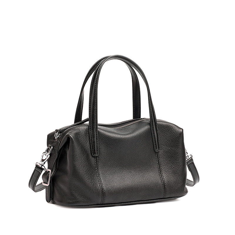 Black top-grain cowhide soft pillow bag on white background
