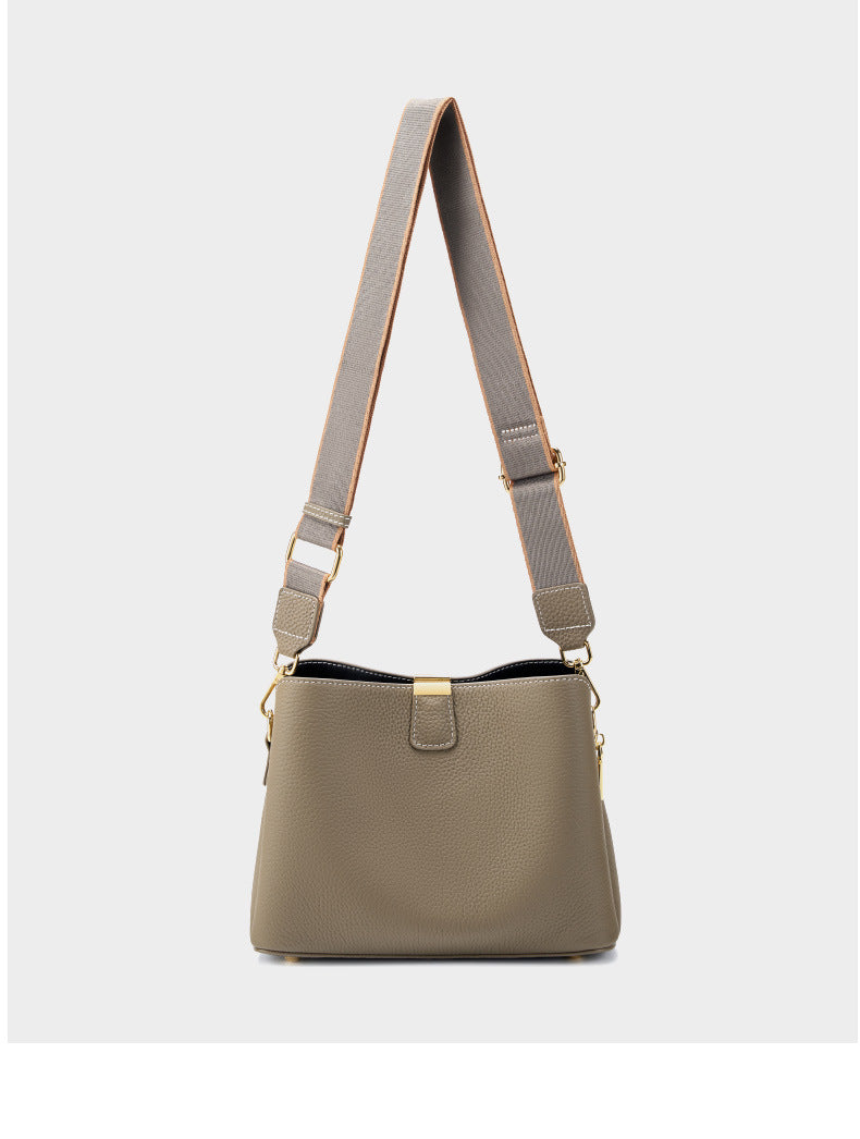 Full view of the bag's woven fabric strap