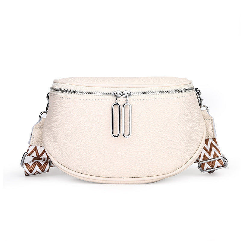 White leather bag with striped patterned strap