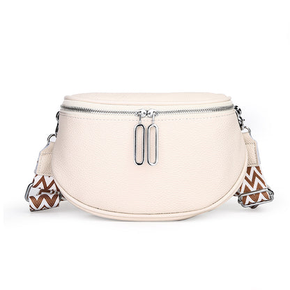 White leather bag with striped patterned strap