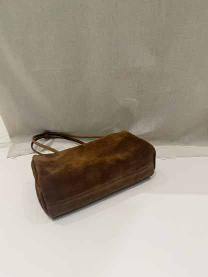 Caramel-colored tote shown standing with two handles