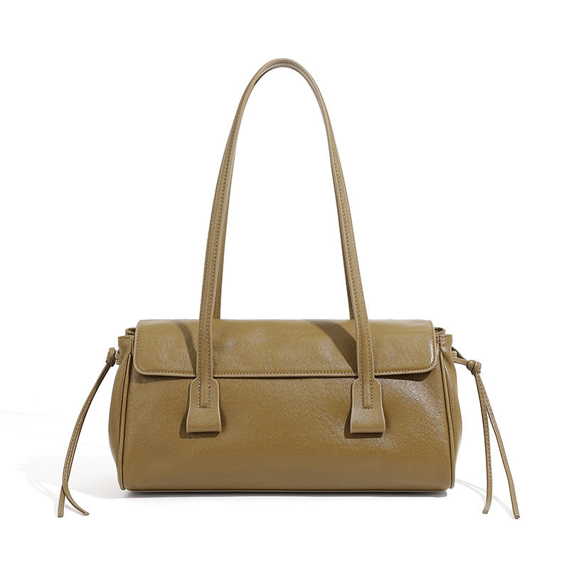 Olive green cowhide leather shoulder bag with top handles on white background