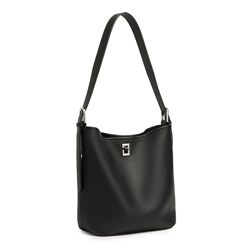 Black top-grain cowhide leather bucket bag on white background