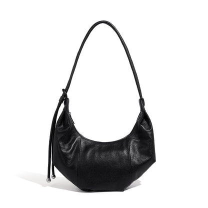 Top-grain cowhide crescent hobo bag with adjustable shoulder strap on white background
