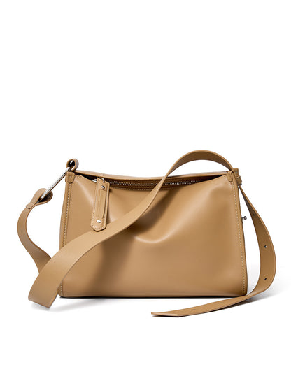Apricot pillow crossbody bag three-quarter studio view