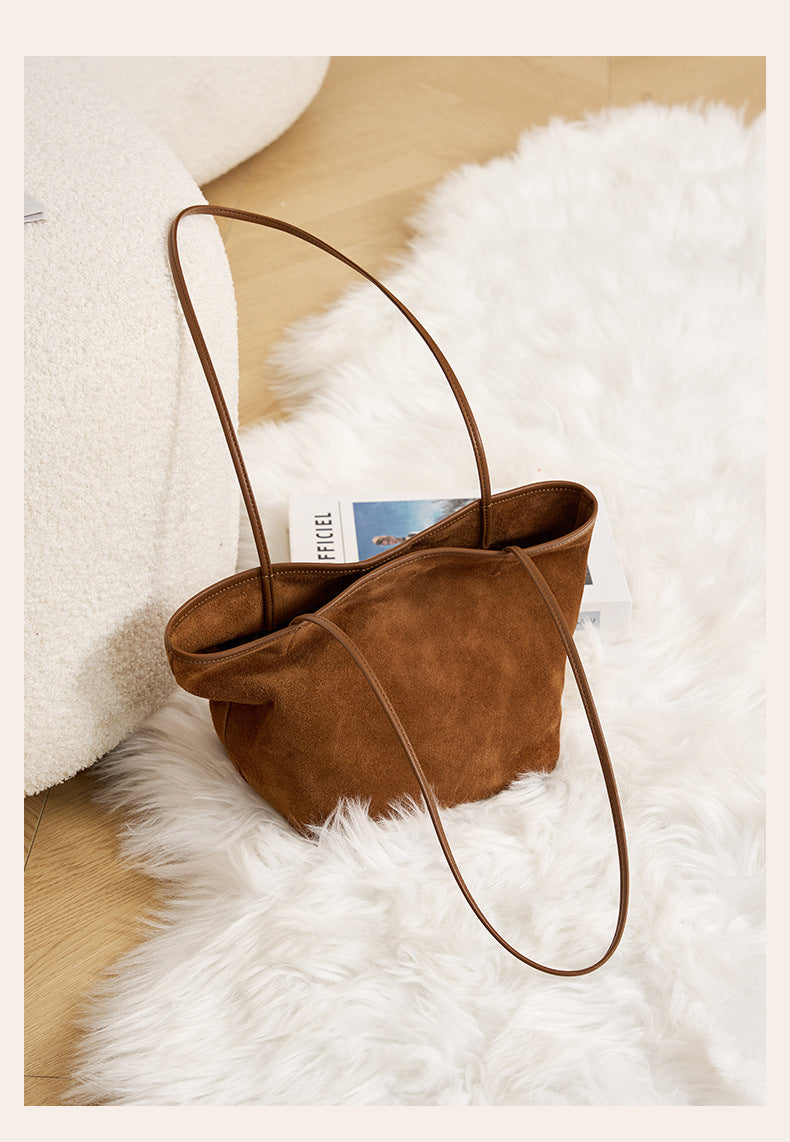 Coffee suede tote displayed open to show interior