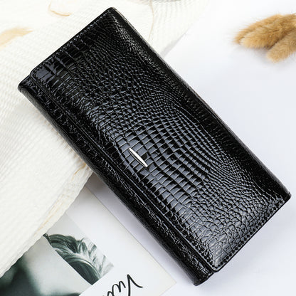 Black textured cowhide long clutch wallet with a slim metal accent