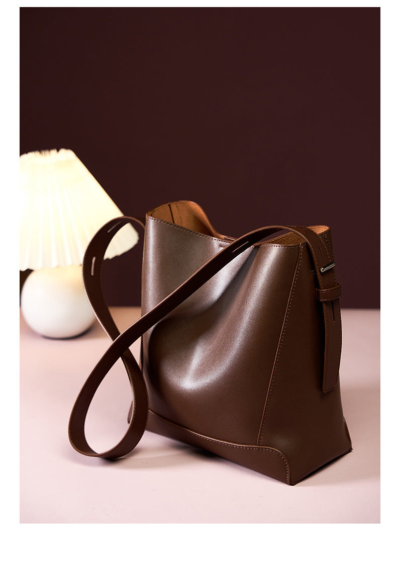 Coffee bucket bag with lamp and decor on table